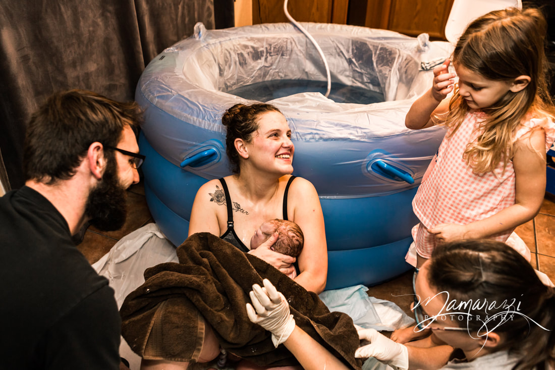 Moment of birth - waterbirth in a San Antonio birth center